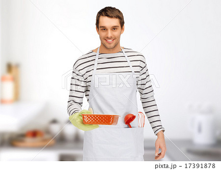 happy man or cook with baking and kitchenware happy man or cook with baking and kitchenware 17391878