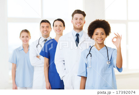 group of happy doctors at hospital group of happy doctors at hospital 17392074