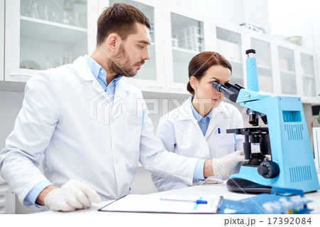 young scientists making test or research in lab 17392084