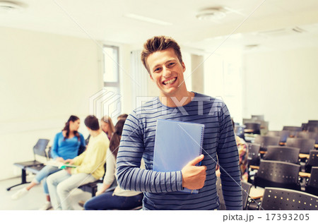 group of smiling students in lecture hall 17393205