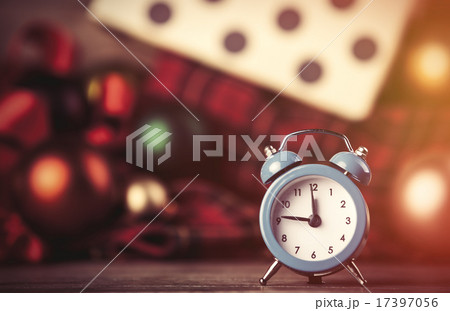 Alarm clock and christmas gifts on background. Alarm clock and christmas gifts on background. 17397056
