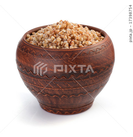 buckwheat in pot isolated on white 17398754