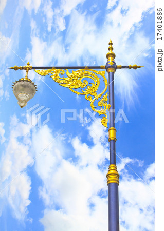 golden lighting pole on blue sky 17401886