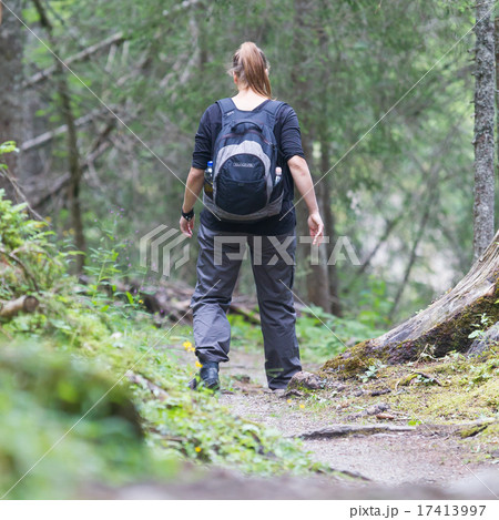 Hiker, young woman with backpack 17413997