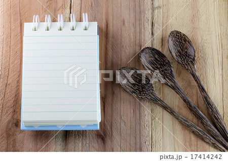 Notebook and wooden spoon. 17414242
