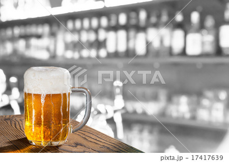 glass of beer in the pub 17417639