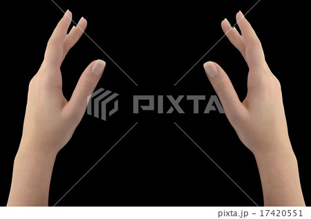 Woman's healing hands isolated on black Woman's healing hands isolated on black 17420551