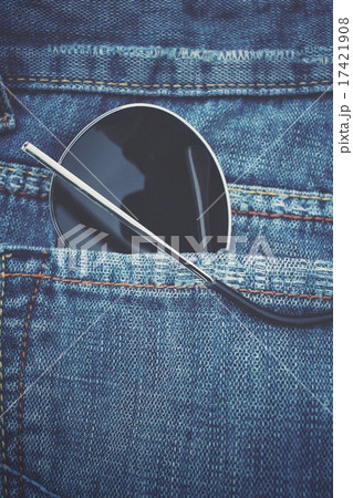 Glasses in jeans pocket 17421908