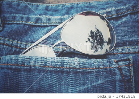 Glasses in jeans pocket Glasses in jeans pocket 17421918