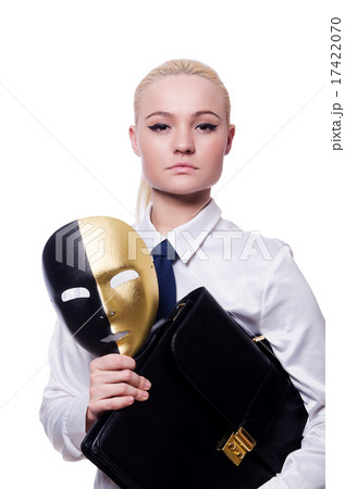 Woman with mask in hypocrisy concept Woman with mask in hypocrisy concept 17422070