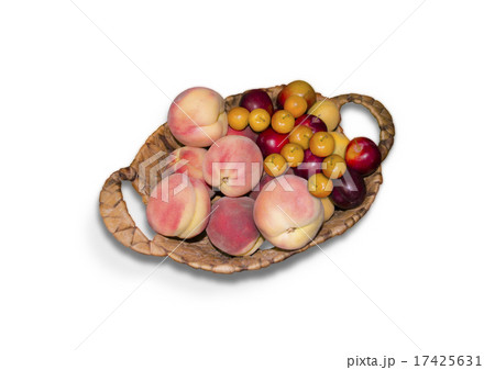 Old straw basket with peaches and plumson Old straw basket with peaches and plumson 17425631
