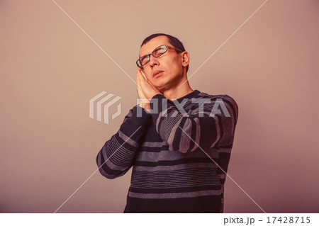 European-looking man of 30 years in glasses wants to sleep ret European-looking man of 30 years in glasses wants to sleep ret 17428715