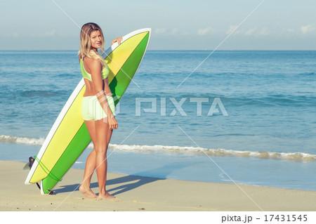 Beautiful Surfer Girl on the Beach Beautiful Surfer Girl on the Beach 17431545
