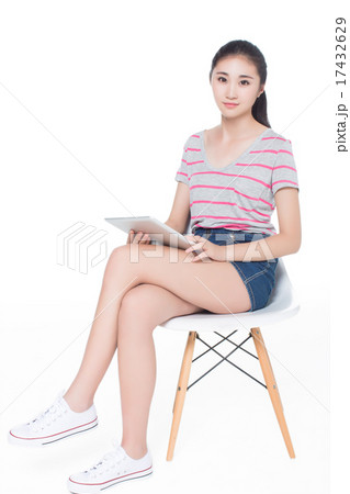 girl sitting on a chair 17432629