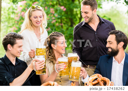 Friends or colleagues on beer garden after work 17438262