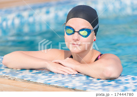 Female swimmer in blue water swimming pool. Sport woman. Female swimmer in blue water swimming pool. Sport woman. 17444780