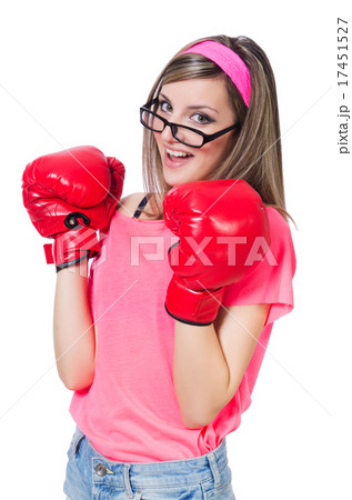 Young lady with boxing gloves on white 17451527