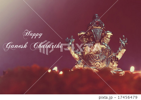 Ganesh idol shining due to oil lamp, retro effect 17456479