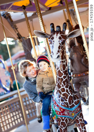 family at the amusement park 17459399
