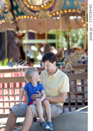 family at amusement park family at amusement park 17459440
