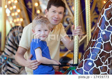 family at amusement park family at amusement park 17459773