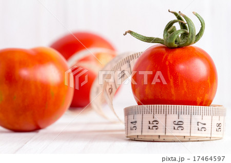 Tomato fruits and tailor measuring tape Tomato fruits and tailor measuring tape 17464597