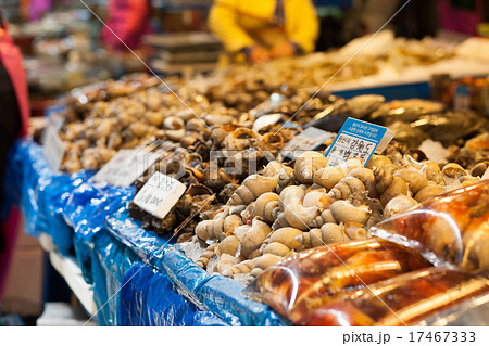 Sea snails and other shells at fish market Sea snails and other shells at fish market 17467333