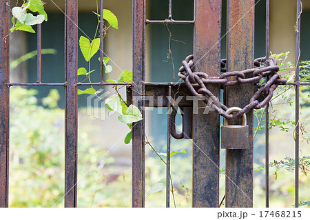 Padlock lasso with rusty chain in the old house. Padlock lasso with rusty chain in the old house. 17468215