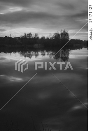 Black and white of a mountain lake under partly 17471427