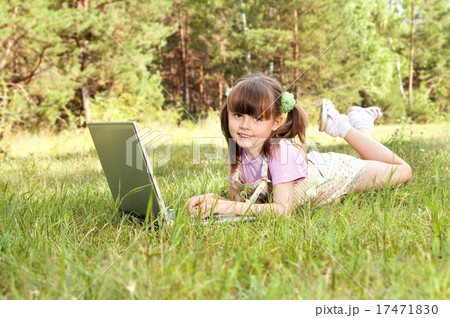 little girl with computer 17471830