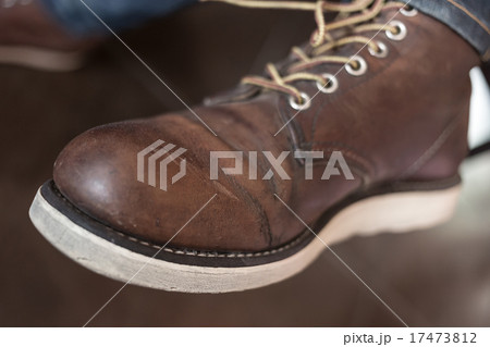 old brown boot leather shoes, close-up image 17473812