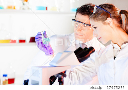 Researcher observing indikator colour shift. 17475273