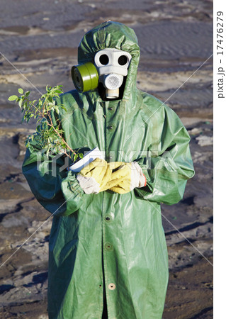 Scientific Environmentalist gently hugs a plant Scientific Environmentalist gently hugs a plant 17476279