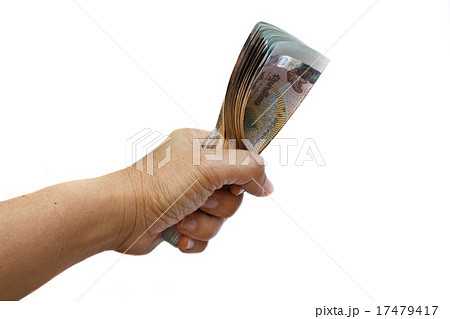 Hand holding thai money. 17479417