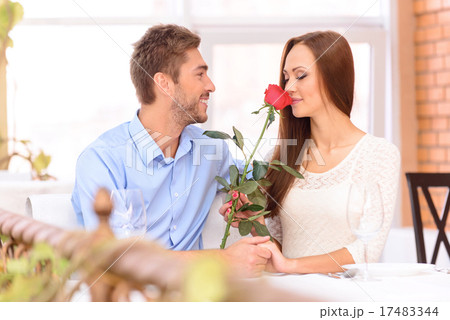 Nice couple sitting at the table Nice couple sitting at the table 17483344