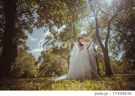 Married Couple in forest embracing 17494636