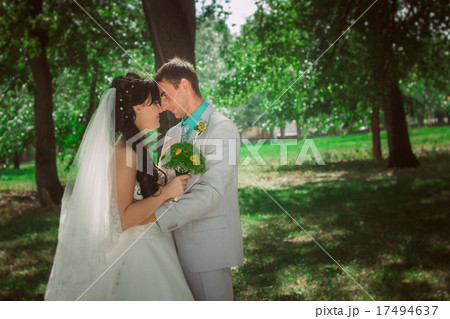 Married Couple in forest embracing 17494637