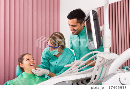 Happy patient at dental clinic 17496953