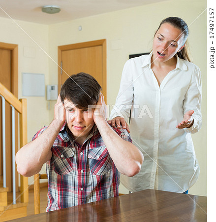 Woman having problems with her husband Woman having problems with her husband 17497157