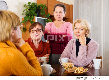 sad senior female friends sad senior female friends 17497360