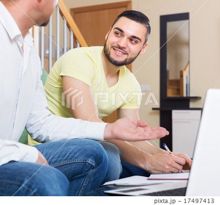 Professor giving lesson to student 17497413