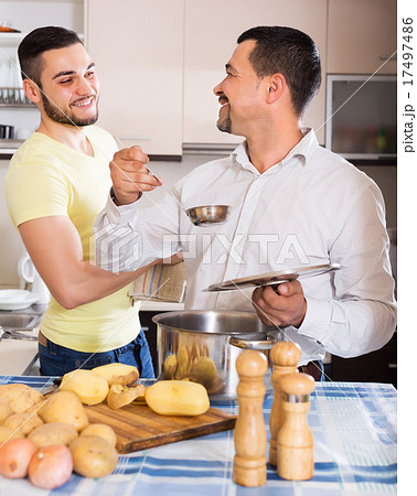 Son helping father to prepare Son helping father to prepare 17497486