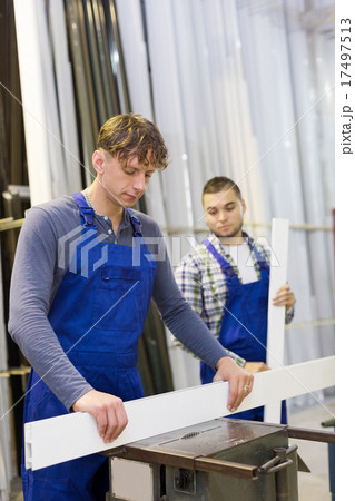 Couple of workmen at factory 17497513