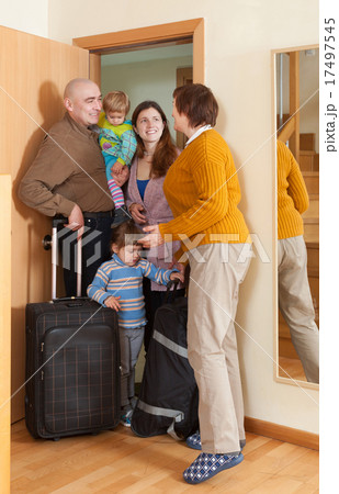 Family of four coming home Family of four coming home 17497545