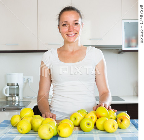 woman cooking dish from apples woman cooking dish from apples 17497599