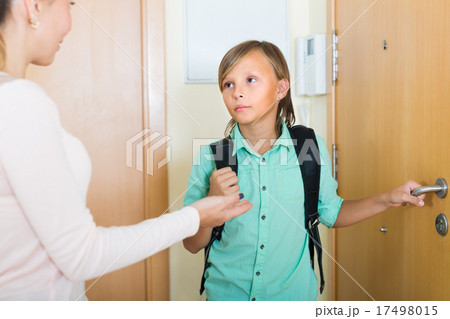 Mother and son near door Mother and son near door 17498015
