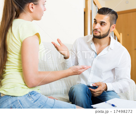 couple with documents in apartment 17498272