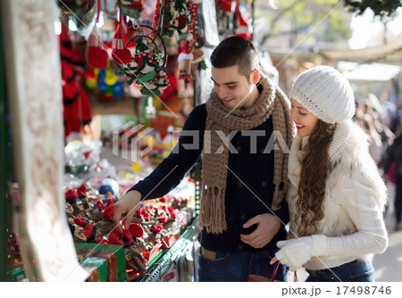 girl with boyfriend choosing tradition catalan Christmas souven 17498746