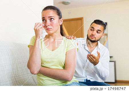 woman cries while quarreling with man 17498747