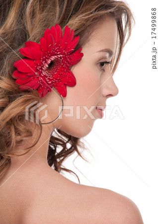 Close-up of beautiful girl with red aster flower 17499868